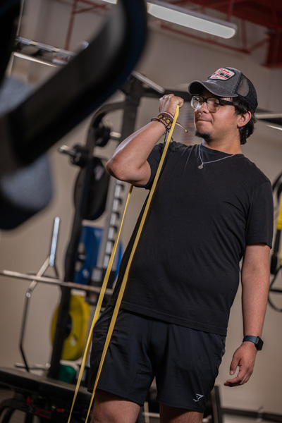 UHV student working out in the sports lab