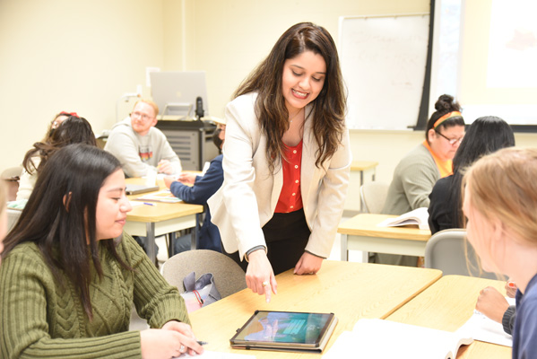 A female instructor teaching class