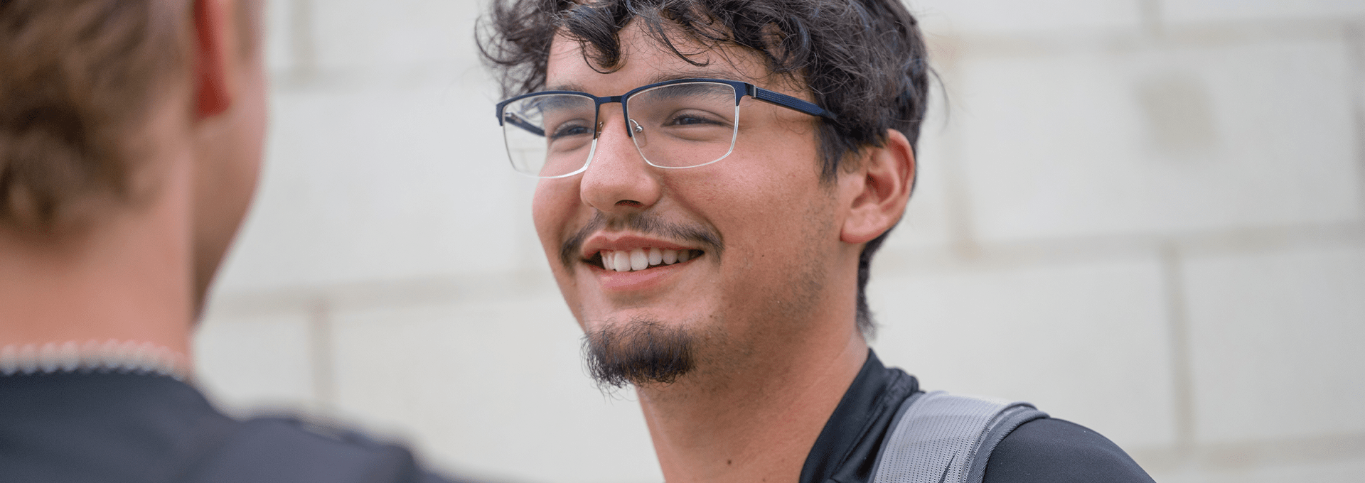 closeup of male student smiling