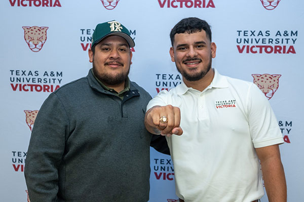 A student proudly shows off their new Texas A&M University-Victoria class ring