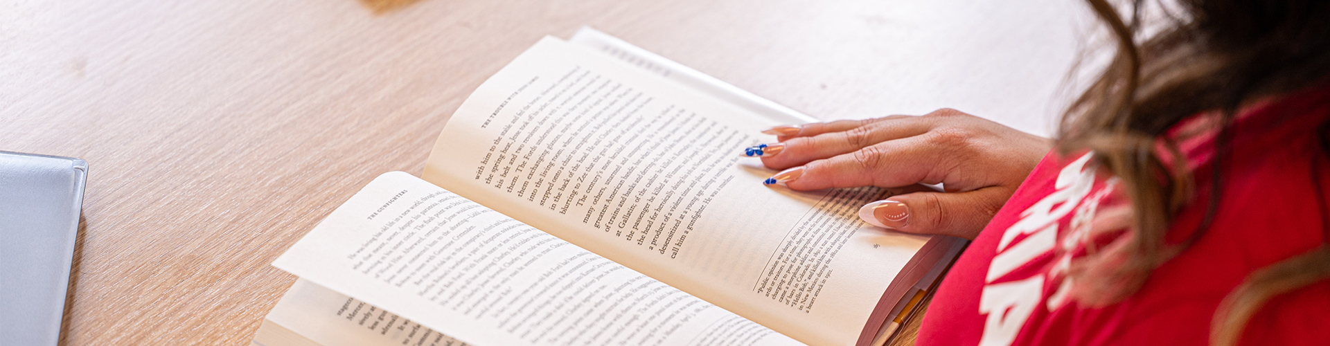 A student reading a book.